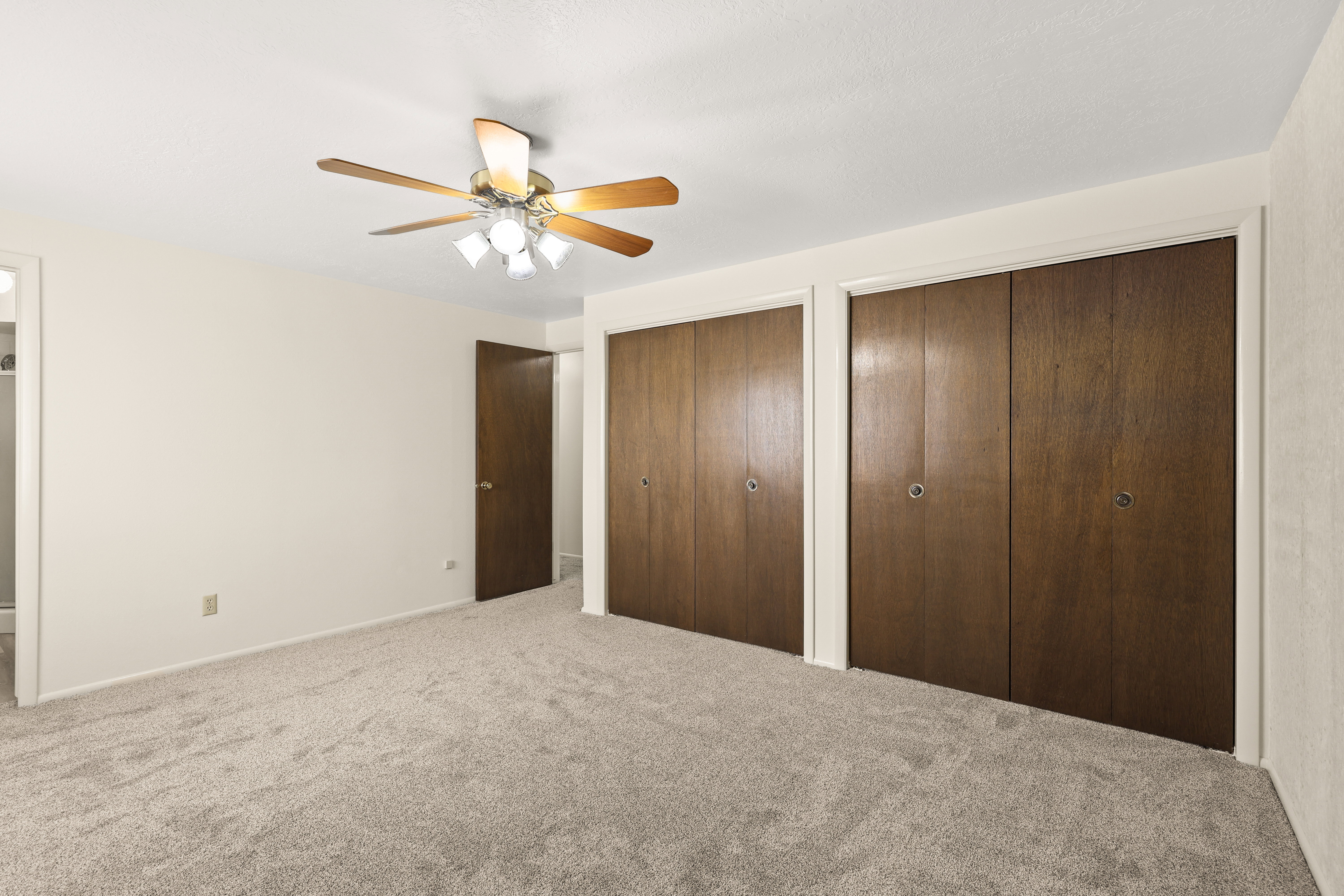 light gray carpeting paired with light walls
