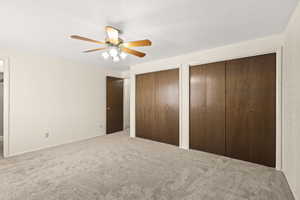 Neutral-toned carpeting paired with light walls