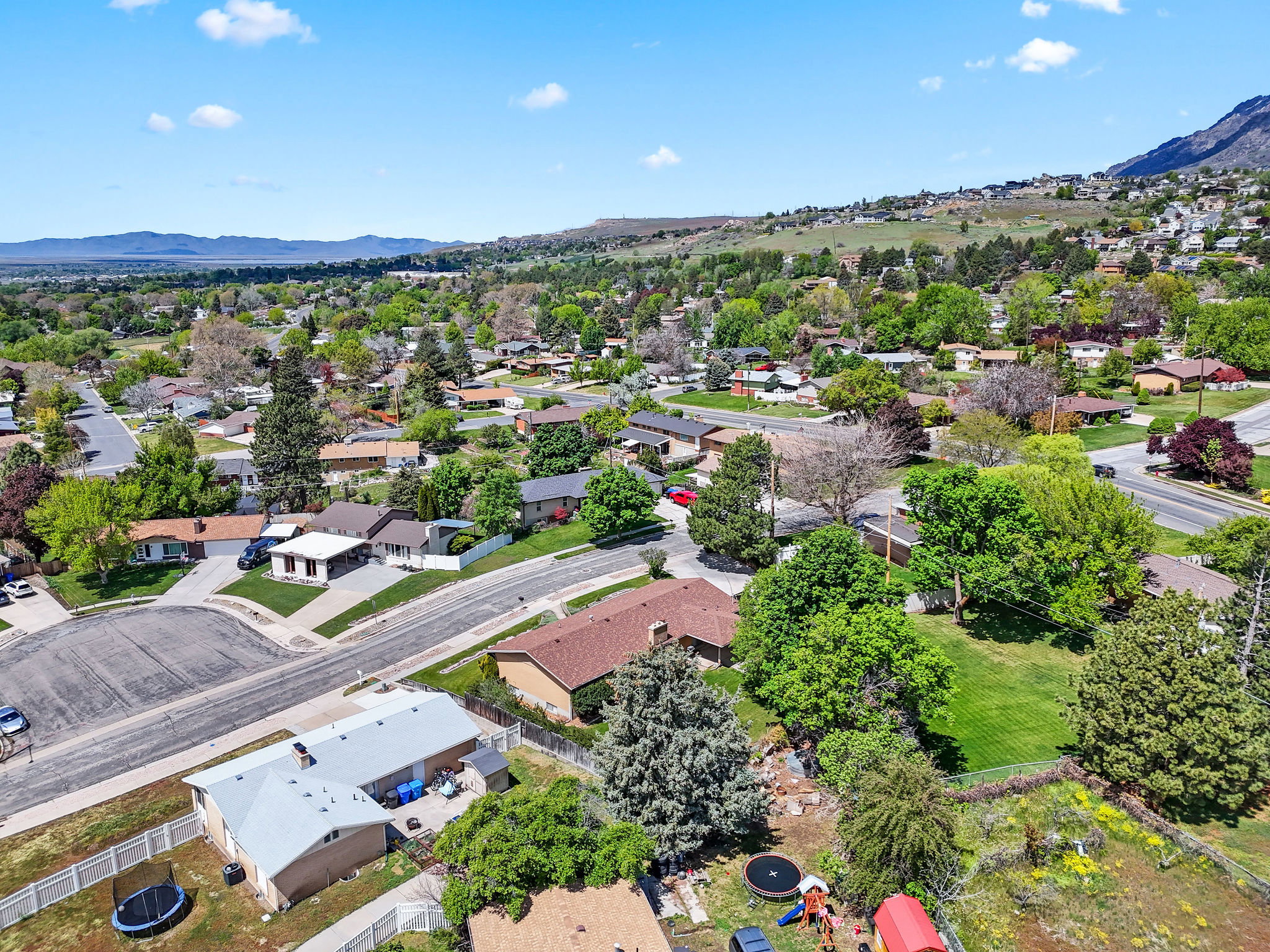 Aerial view of residential area with mountains