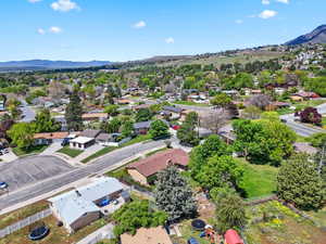 Aerial view of residential area with mountains