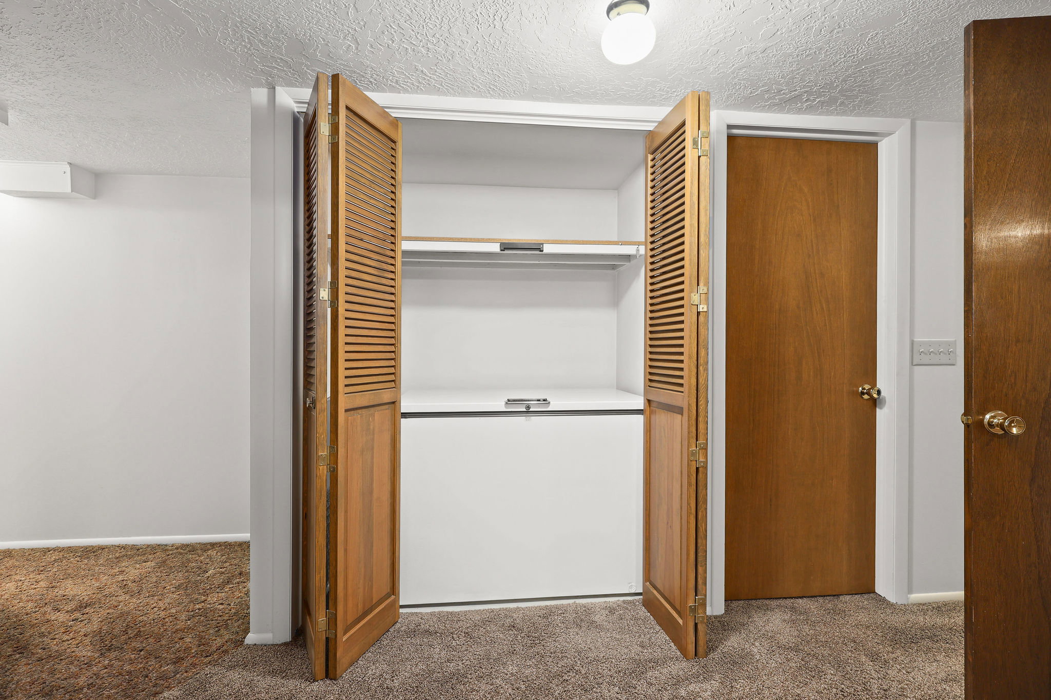 View of closet with included freezer
