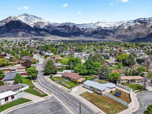 Aerial view of residential area featuring a mountain backdrop