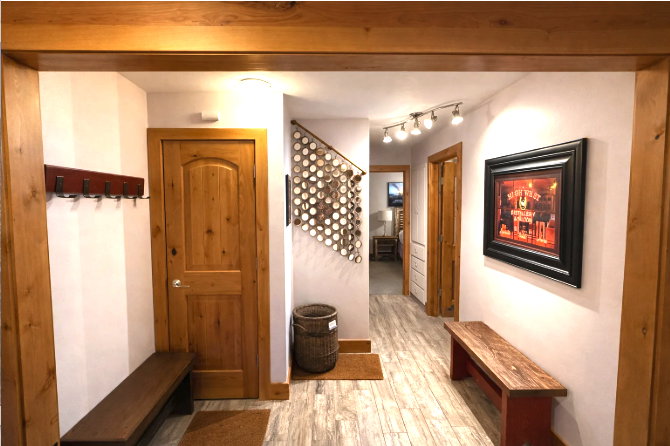 Mudroom featuring light wood-style flooring