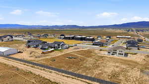 Aerial view of residential area with mountains