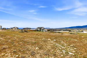 View of yard with a mountain view and a residential view