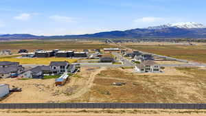 Aerial view of residential area with a mountainous background