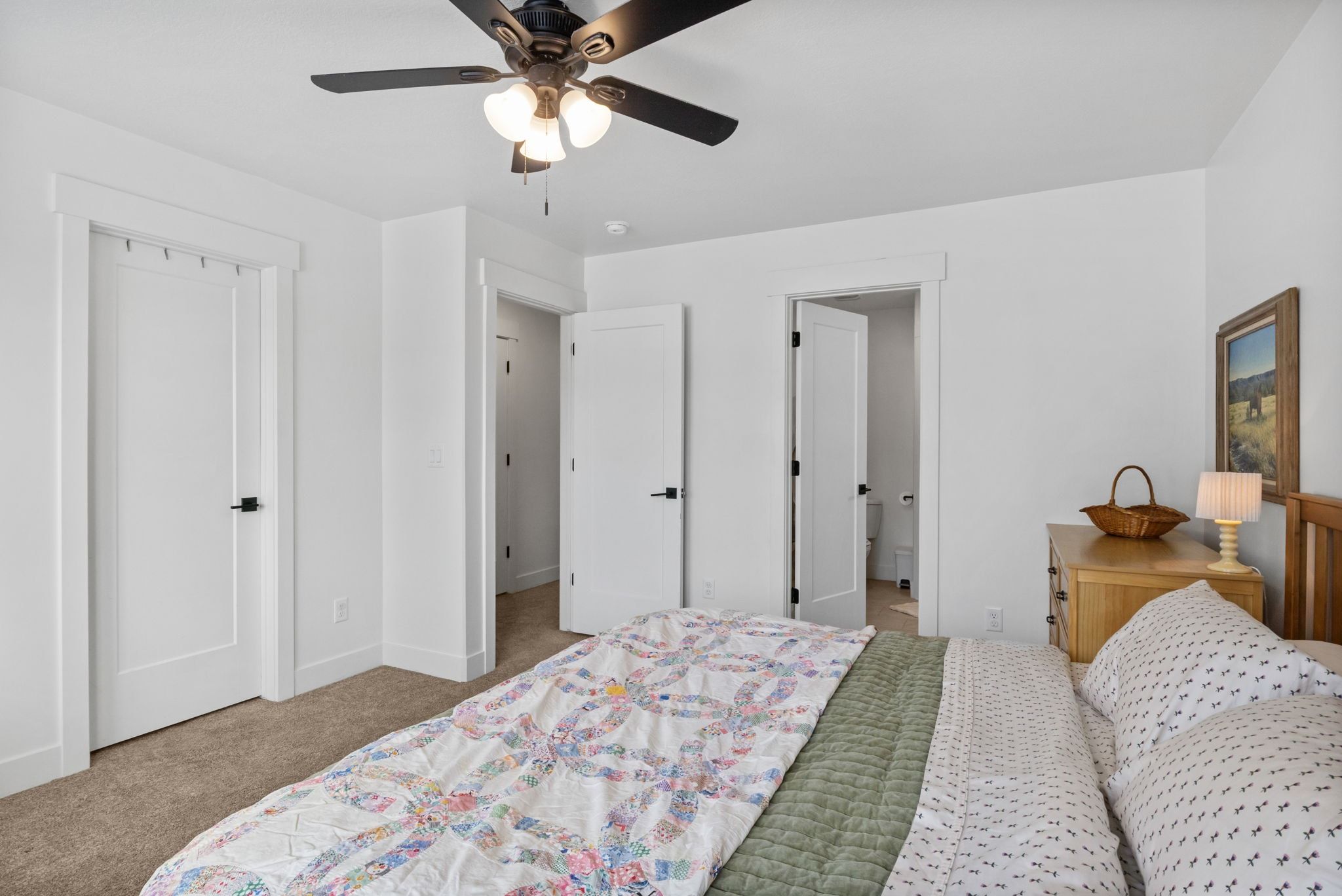 Bedroom with carpet flooring and ceiling fan