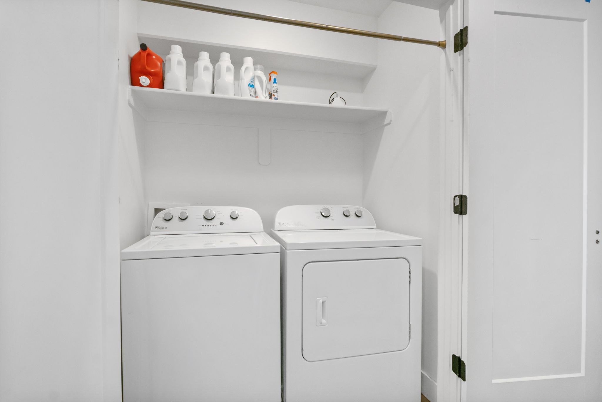 Laundry area featuring washer and clothes dryer