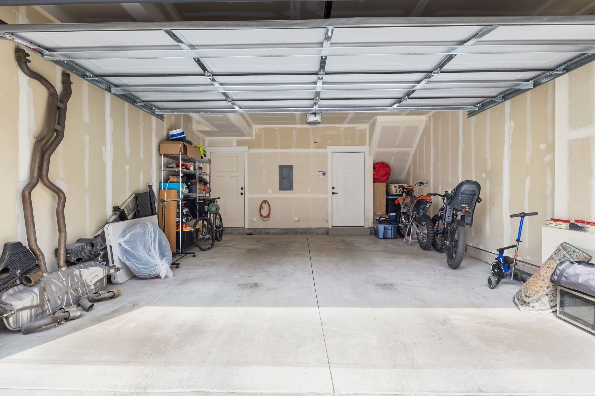 Garage featuring electric panel