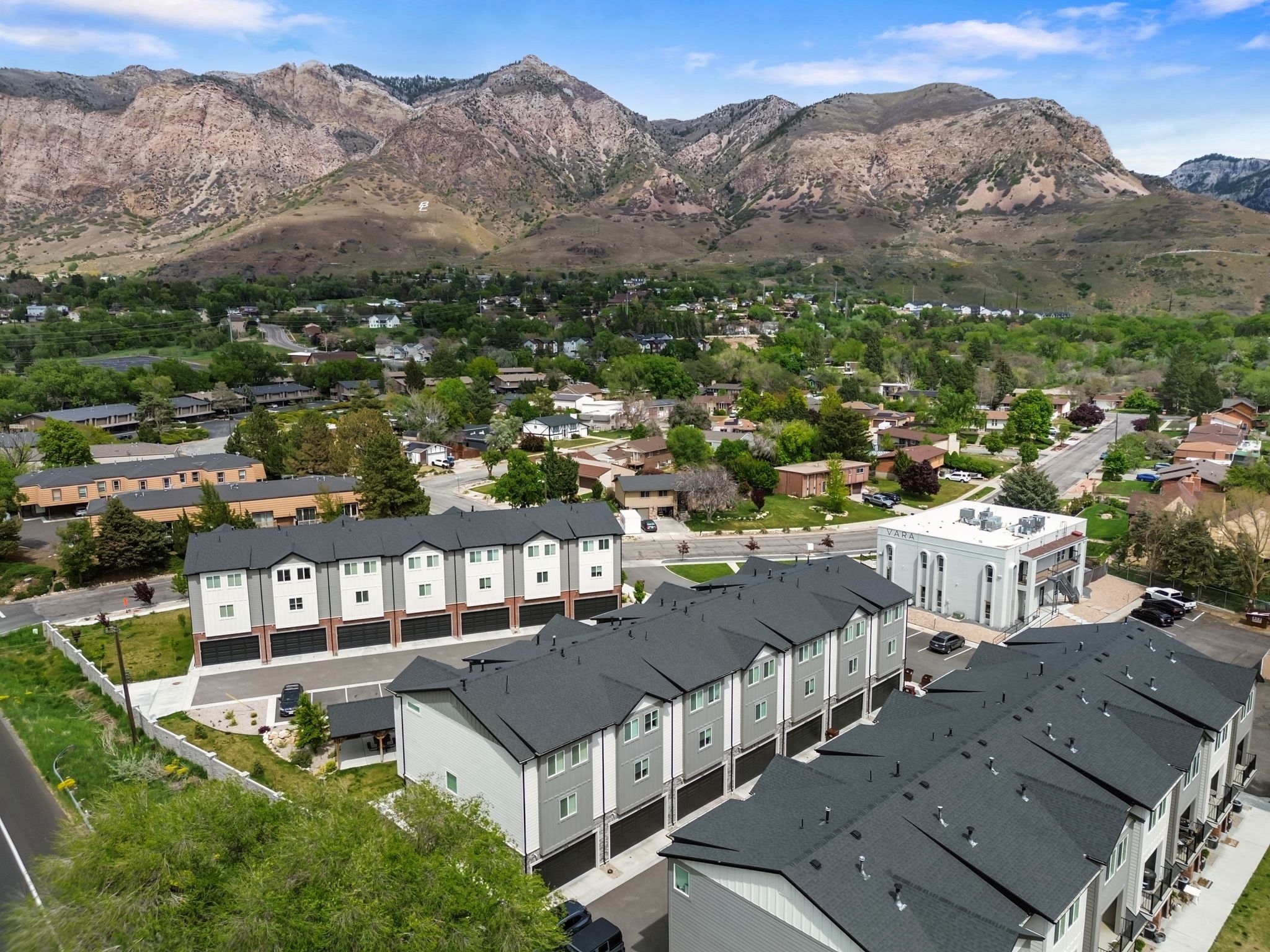 Aerial perspective of suburban area featuring mountains