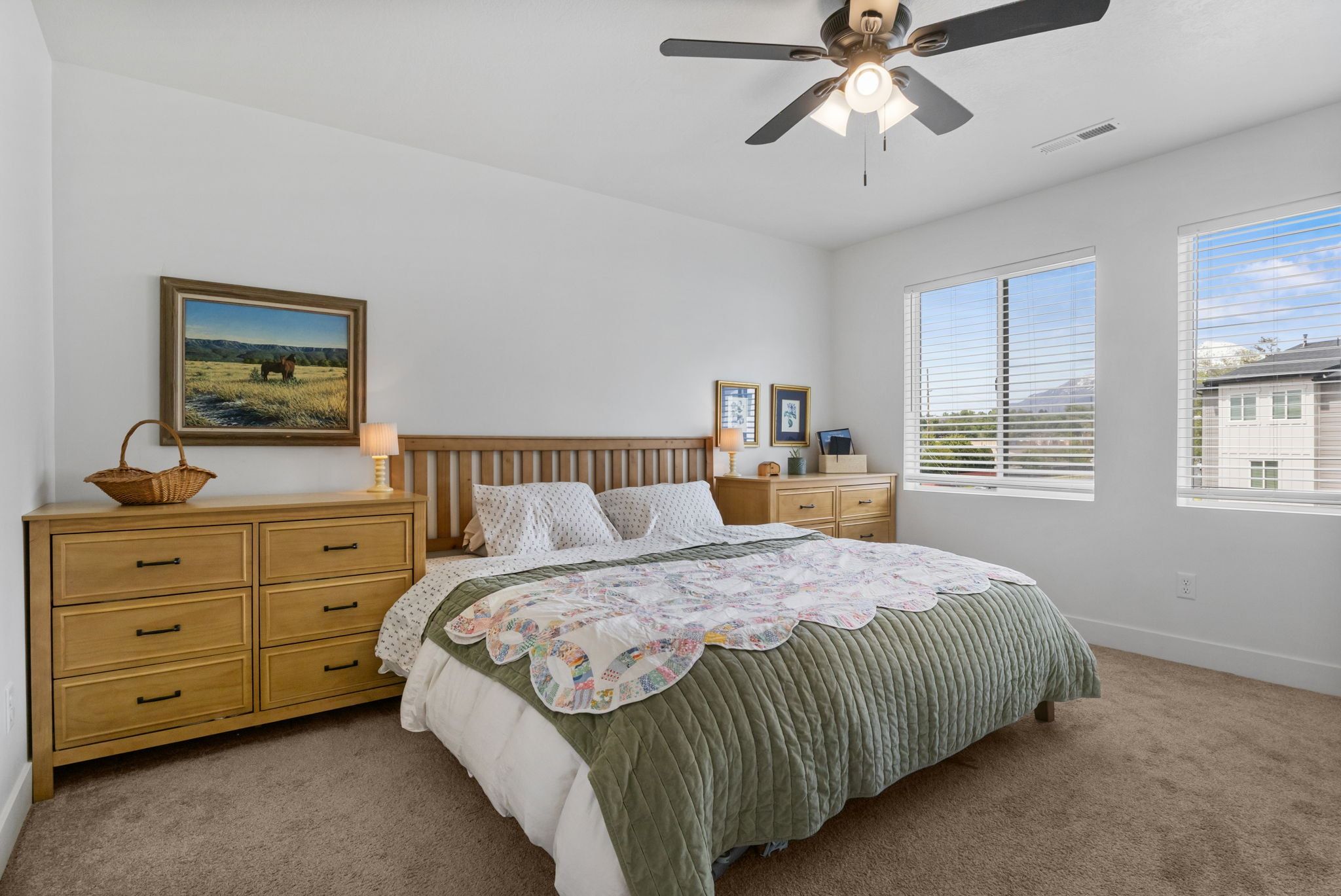 Bedroom with carpet and ceiling fan