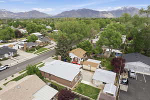 Aerial view of residential area with a mountain backdrop