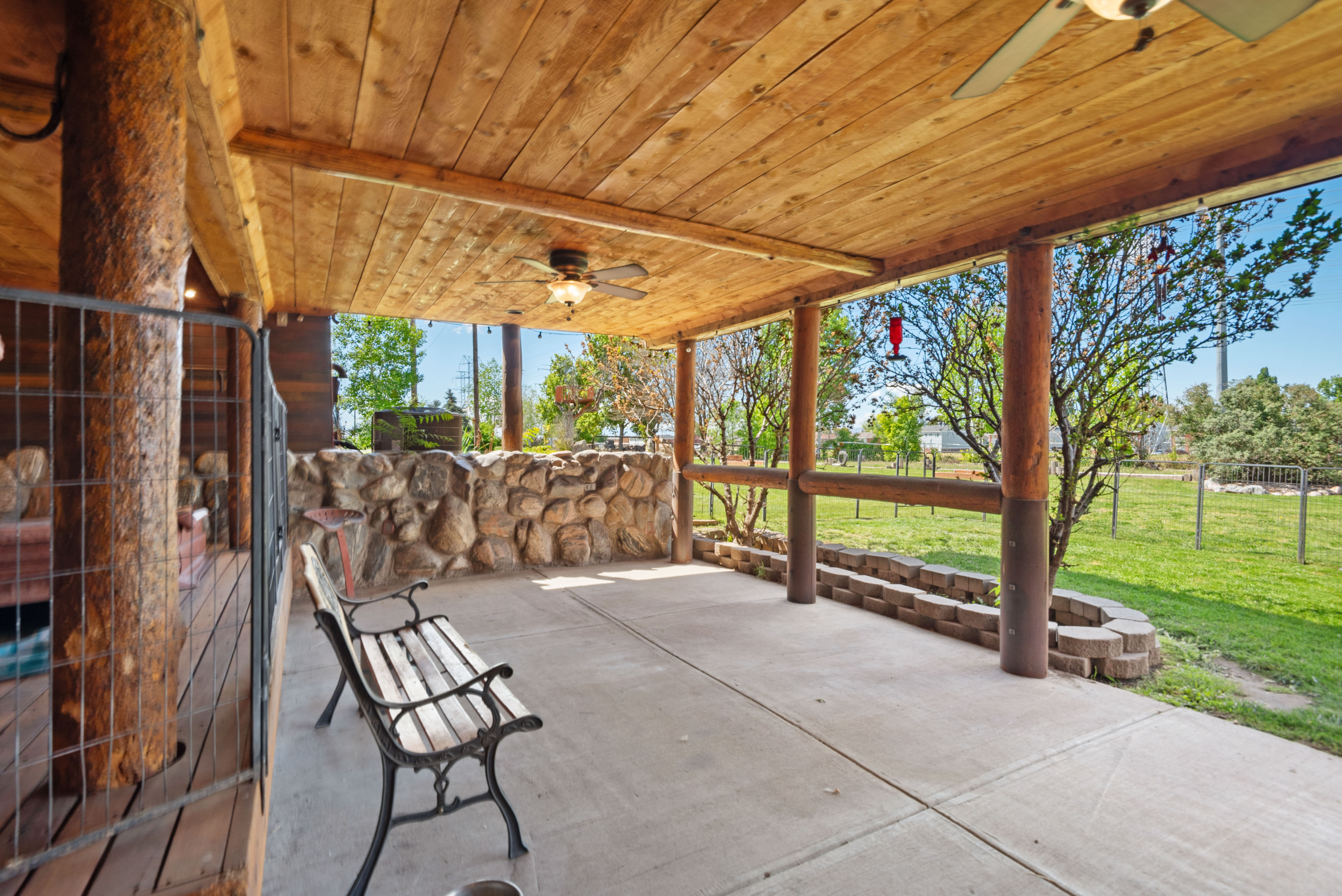 View of patio with a ceiling fan