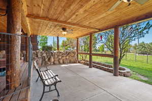 View of patio with a ceiling fan