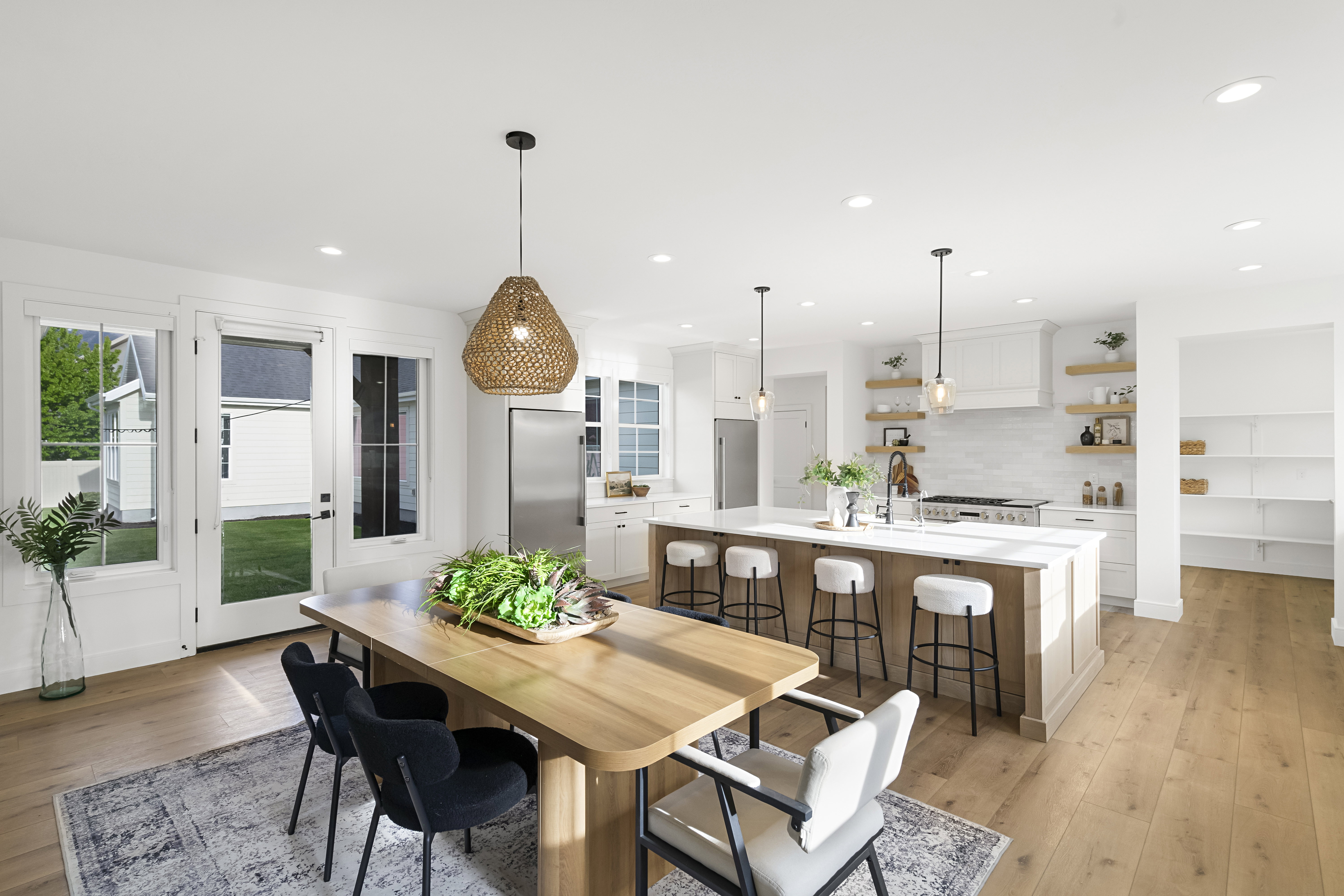 Dining room featuring light wood finished floors and recessed lighting