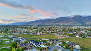 Aerial view of residential area with a mountain backdrop