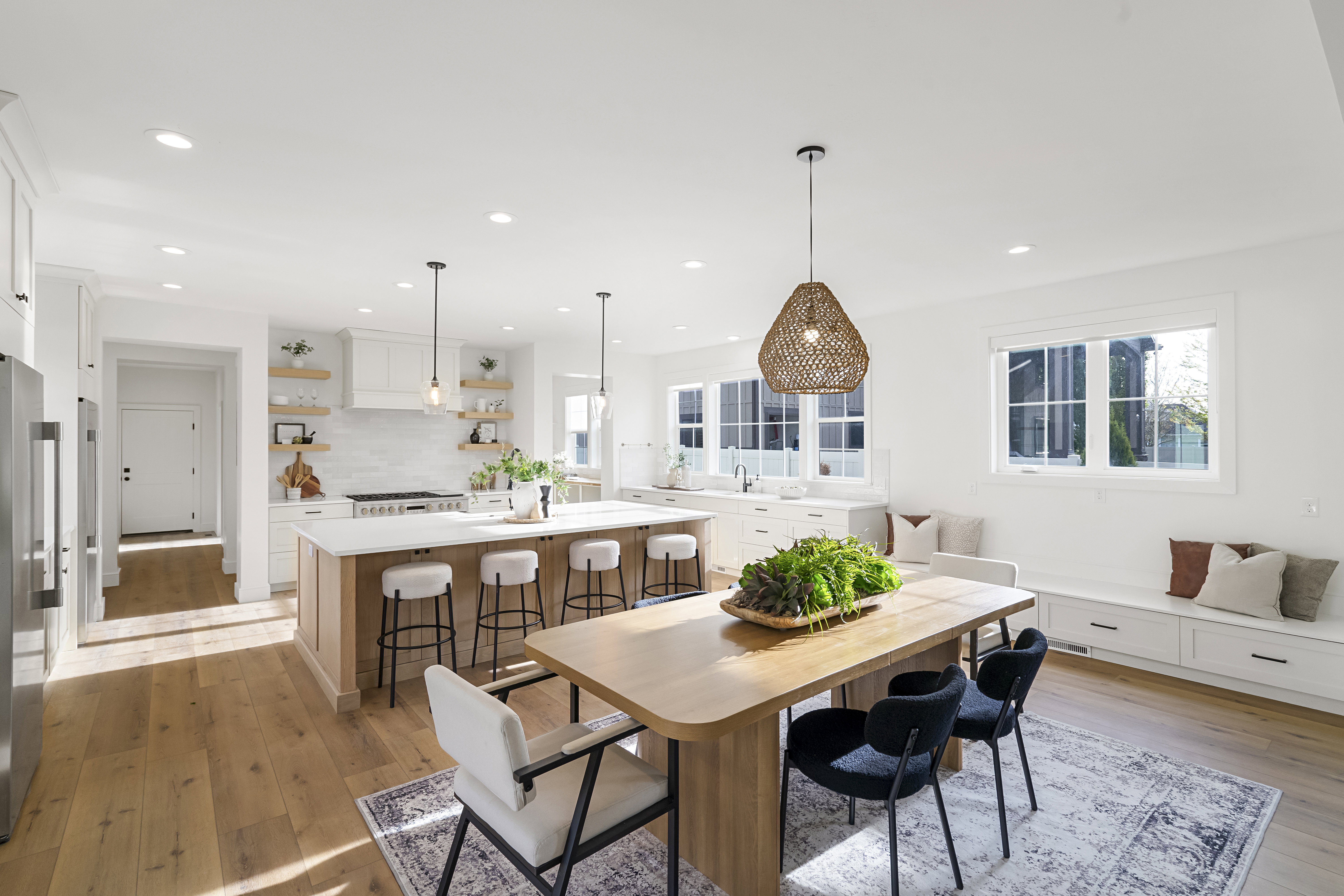 Dining space featuring light wood-type flooring and recessed lighting
