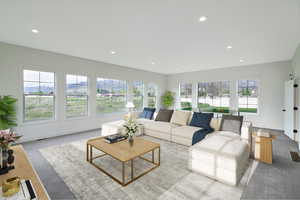 Living room featuring a mountain view and recessed lighting