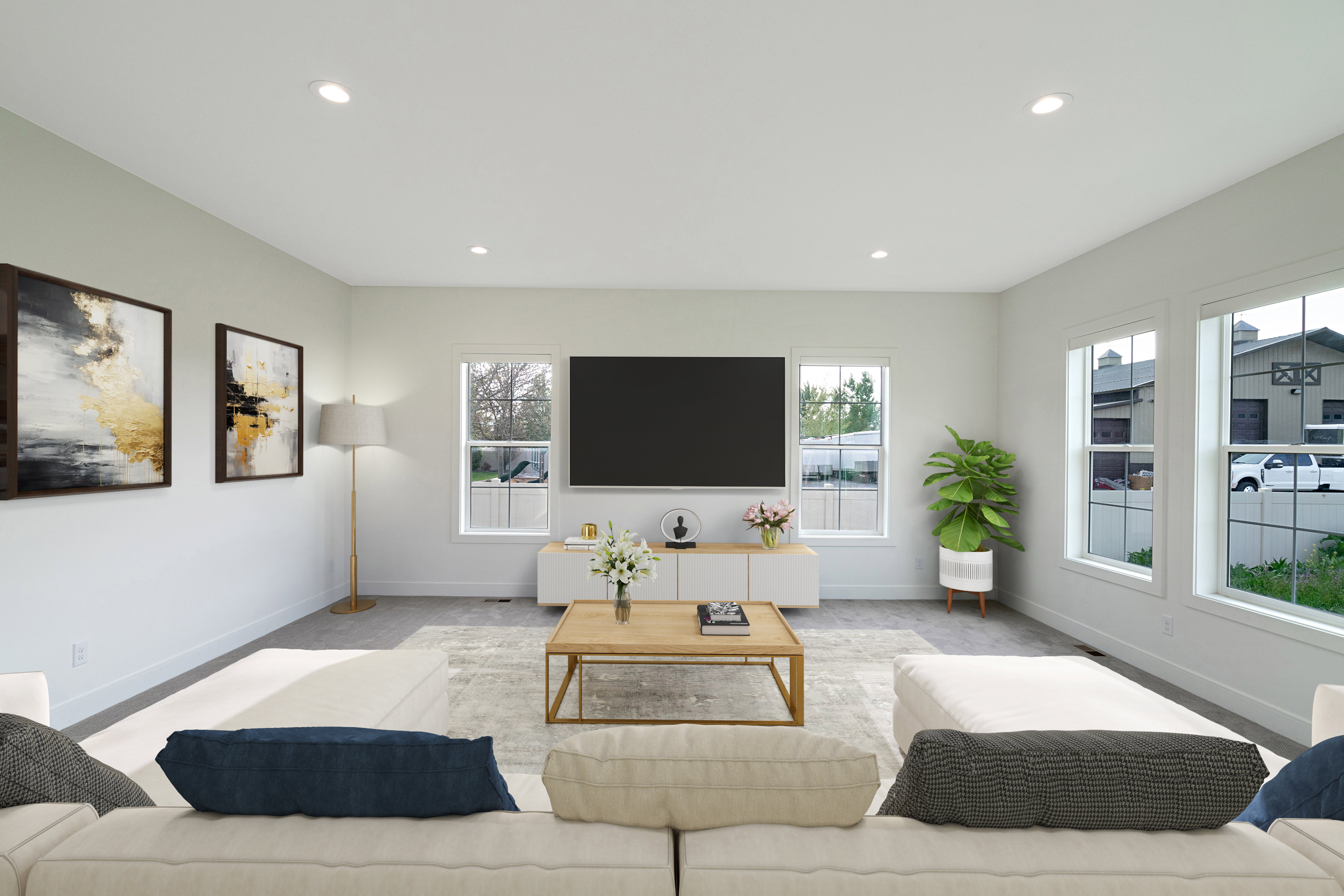 Living area with plenty of natural light and recessed lighting