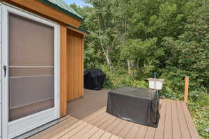 Deck featuring a grill