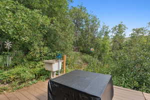 Deck featuring a jacuzzi