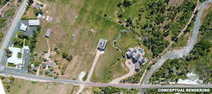 Expansive property featuring a multi-building complex, river frontage, and multiple outbuildings