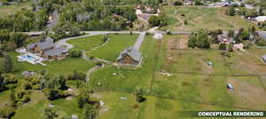 Expansive property featuring a custom-built log home, a separate barn structure, a large swimming pool with surrounding patio, a meandering water feature, and fenced paddocks