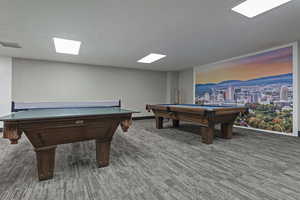 Recreation room featuring billiards and a mountain view