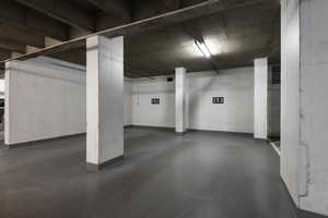 Garage featuring a parking deck