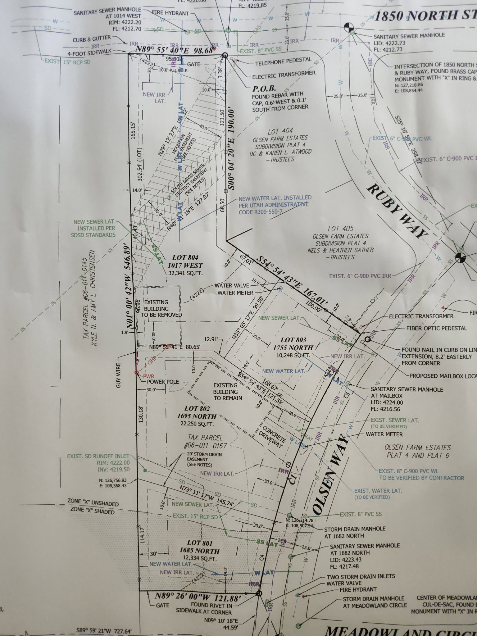 Survey Plat. Illustrating property boundaries, lot numbers, and utility infrastructure