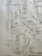 Survey Plat. Illustrating property boundaries, lot numbers, and utility infrastructure