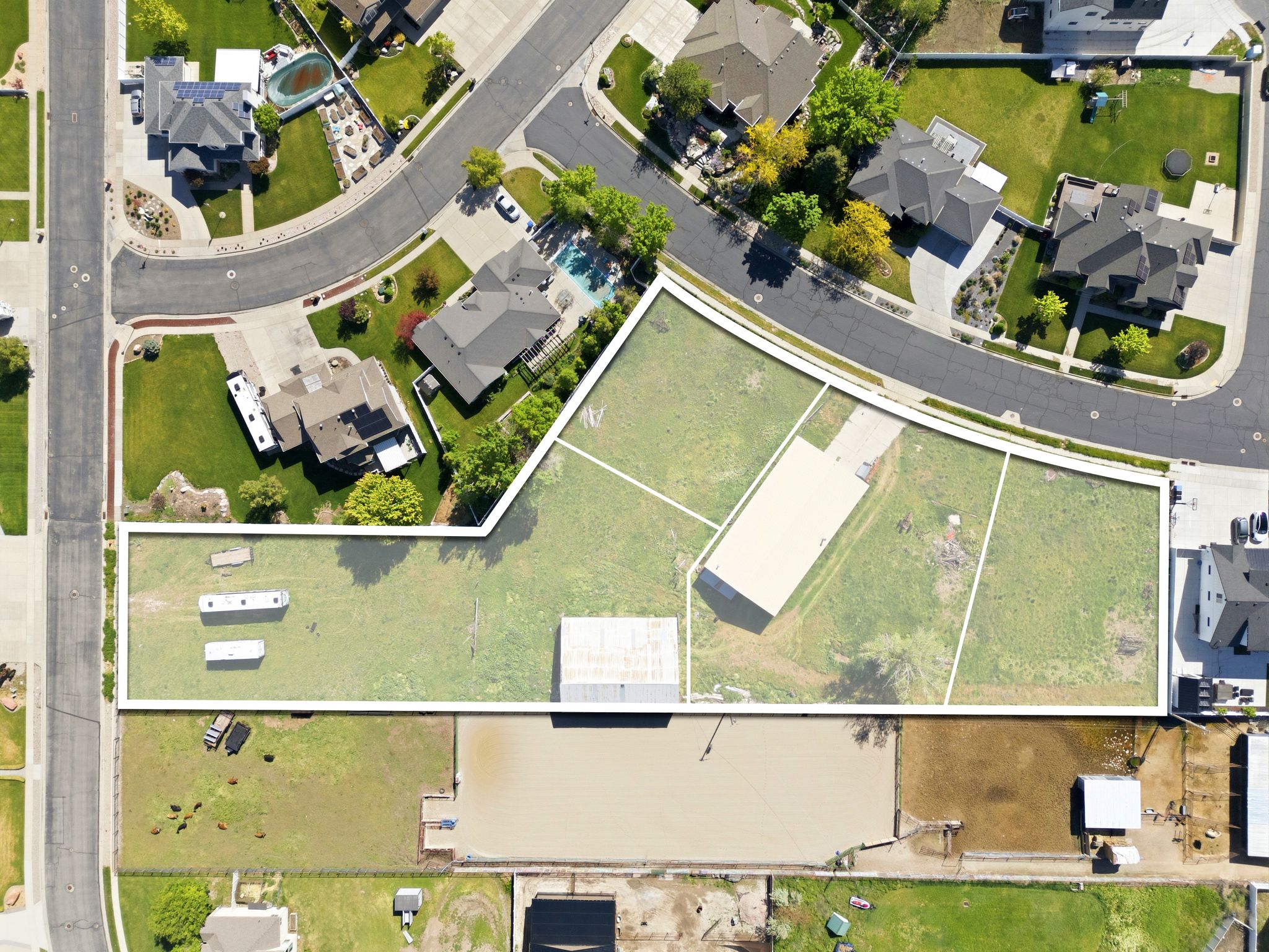 Aerial view of multiple parcels featuring open land