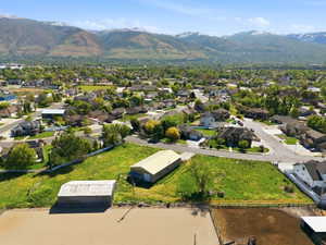 Aerial view of residential area with a mountainous background