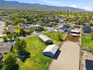 Aerial view of residential area with a mountainous background