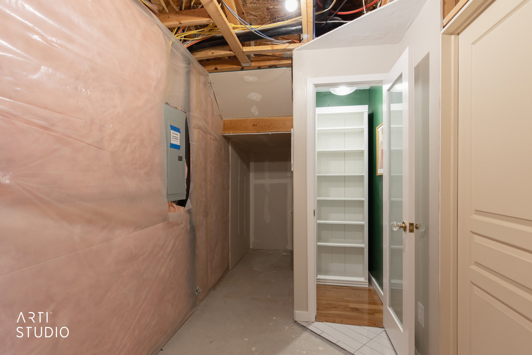 Utility room, with storage, and built in library.