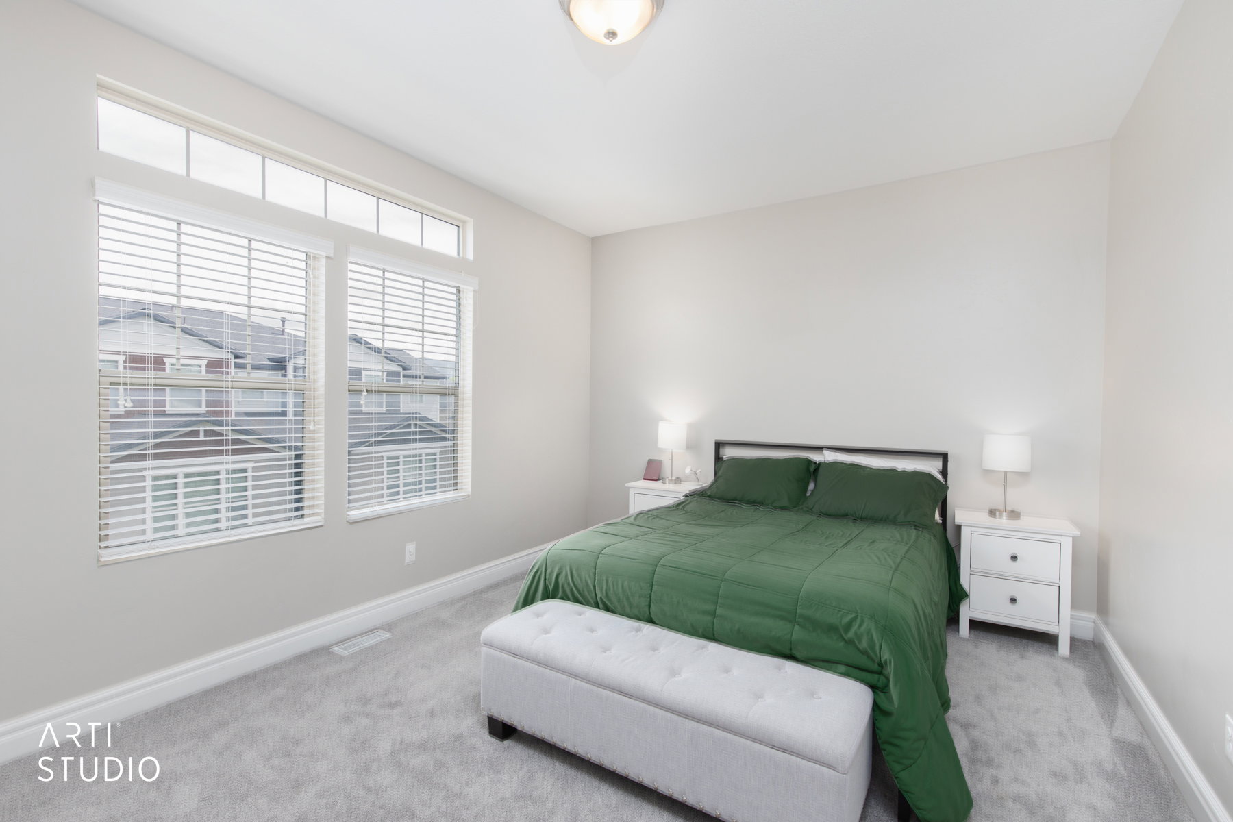 Primary Bedroom with large east facing windows