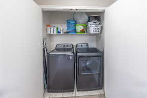Laundry area with separate washer and dryer