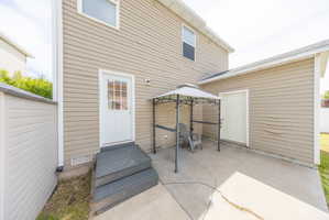 View of patio featuring a gazebo