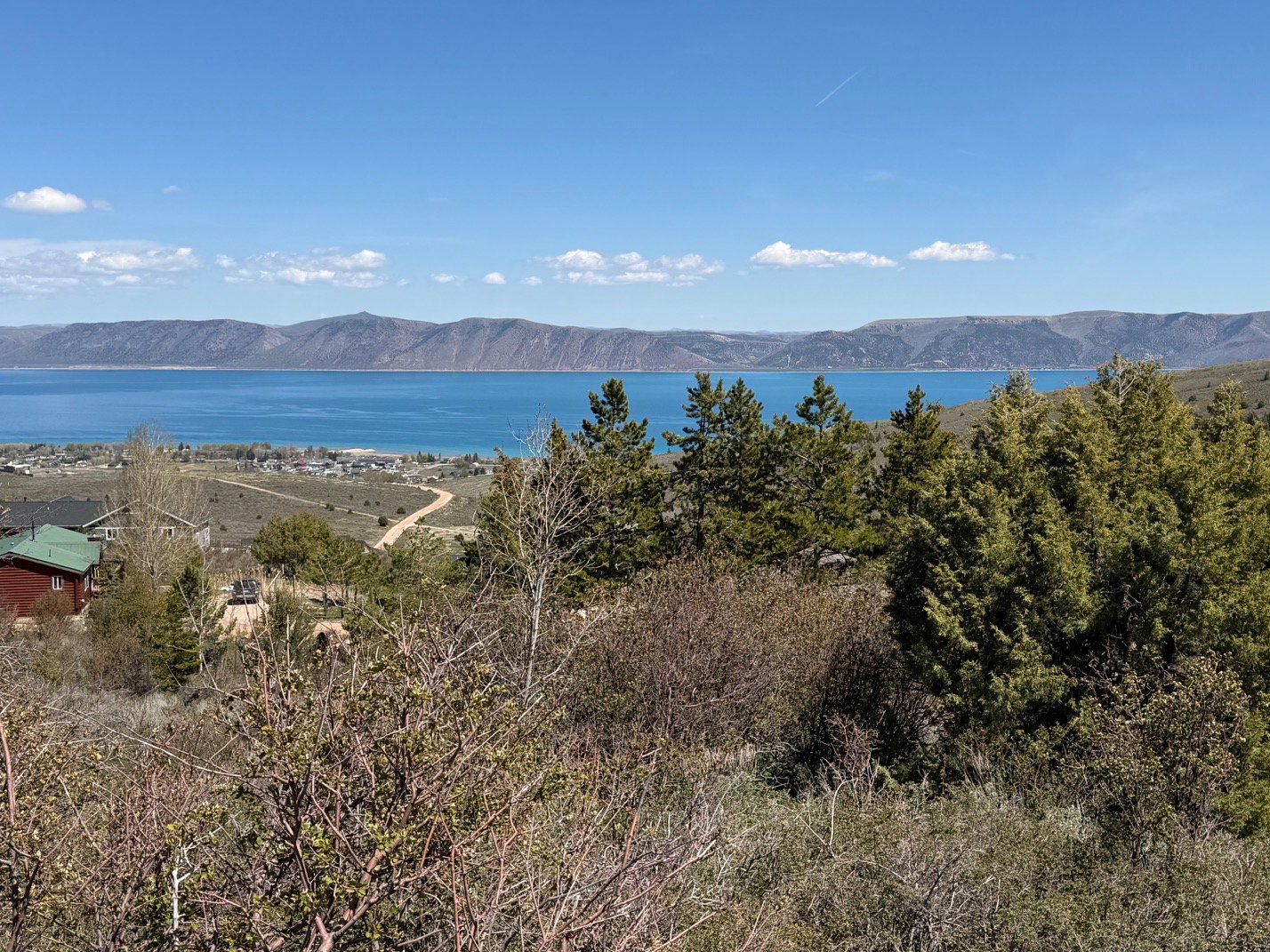 View of mountain backdrop with a large body of water
