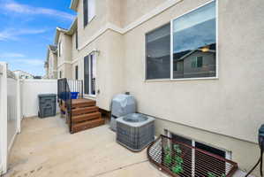 View of patio featuring a grill