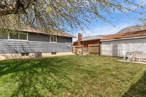 Fenced backyard with a patio