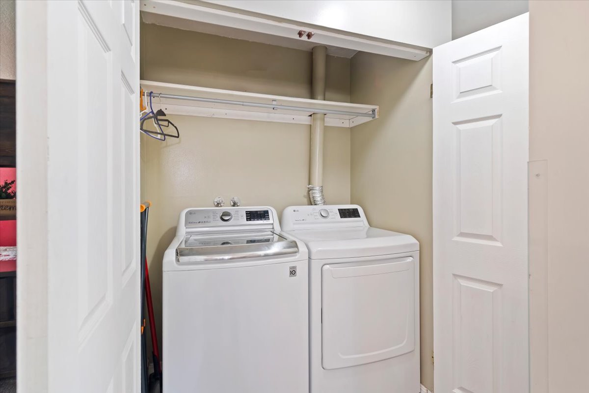 Laundry area with separate washer and dryer