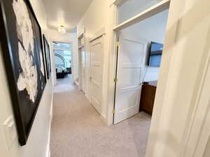 Wrap around hallway with access to guest bed, closet, full bath and master bedroom