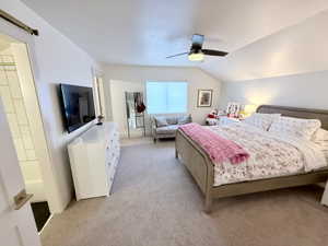 3rd bedroom upstairs featuring a barn door to the full bathroom
