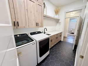Laundry room looking back towards main entry hallway and the flex room.