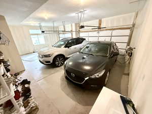 3 Car Garage with storage space and electric vehicle charger