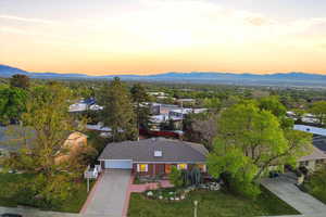 Aerial view at dusk of a mountain view and a residential view
