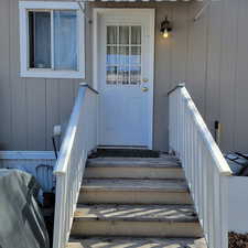 Entrance to property with covered porch