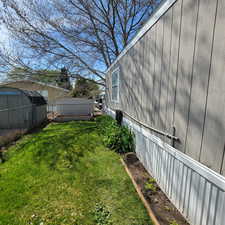 Fenced yard with a shed