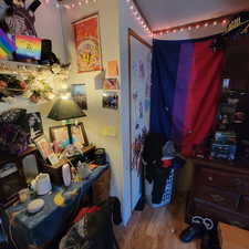 Bedroom with light wood-style flooring